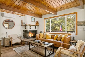 Relax in the comfort of our newly furnished living room, cozy up by the gas log fireplace, and enjoy a movie on our smart TV, complete with complimentary Wi-Fi.
