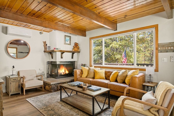 Relax in the comfort of our newly furnished living room, cozy up by the gas log fireplace, and enjoy a movie on our smart TV, complete with complimentary Wi-Fi.