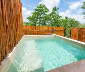 Unwind by the private pool, soaked in sun and serenity