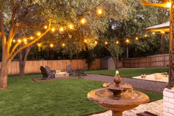 Turn on the firepit and string lights. 