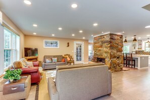 Living Room | Original Fireplace | Smart TVs | 2 Full Sleeper Sofas | 1st Floor