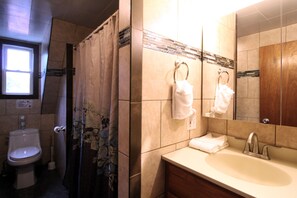 Fully tiled bathroom with heated floor