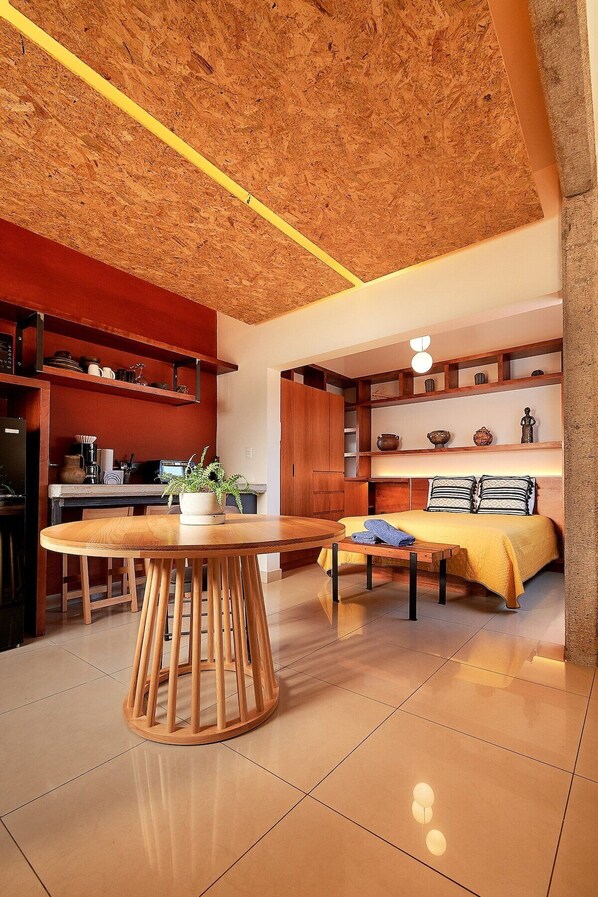 Part of the studio: Queen size bed, kitchenette, big closet.