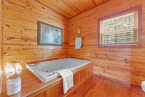 Soak in bliss with bath salts and cozy ambiance
