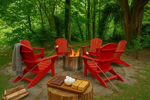 Where city lights fade and nature takes over: experience tranquility by our backyard fire pit.