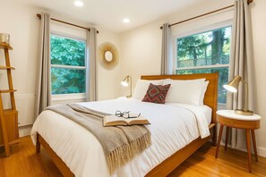 Located on the first floor, experience the luxury of space and comfort with our queen size bed in the tranquil master bedroom.
