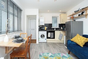 Fully equipped kitchen with washing machine perfect for long term stays