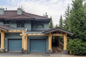Exterior - Top floor 3BR townhome with private garage giving you peace of mind that all your valuable gear is securely stored.