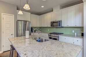 Whip up your favorite meals in the full kitchen