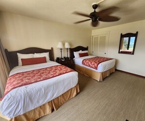 Second bedroom with two full beds. 