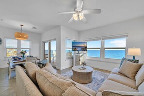 Large, Open Living Space with Stunning Gulf Views: Updated Kitchen w/ Counter-Height Seating for 6, Gulf View Dining Table (seating for 8), Large Sectional Sofa w/ Smart TV, & Private Balcony