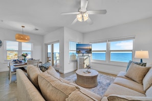 Large, Open Living Space with Stunning Gulf Views: Updated Kitchen w/ Counter-Height Seating for 6, Gulf View Dining Table (seating for 8), Large Sectional Sofa w/ Smart TV, & Private Balcony