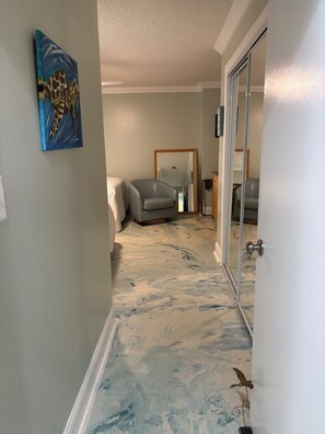 Entrance to guest room 2 Queen beds and full bath with tub
