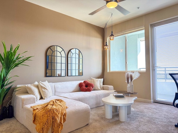 Rustic Vibe Apartment with a stunning Hollywood hills view Living room with a comfy L-shaped sofa and a 55" Smart TV with (Netflix, Hulu, and Disney+ we logged them remotely) included for free