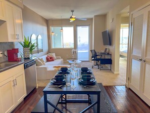Enjoy meals at a cozy dining table for four, perfectly positioned to capture breathtaking views.