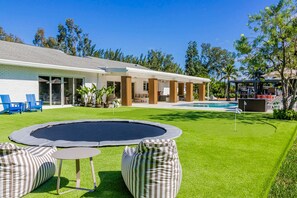 Inground Trampoline & Mini-Golf Putting area