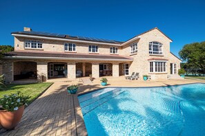 view of the patio from the pool area