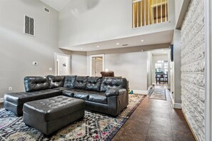 Our larger living room can comfortably seat everyone for a movie or game night!