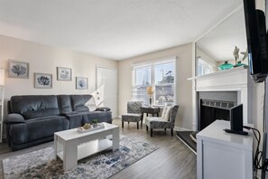 The living room has a smart TV, electric recliners that are so comfy you'll catch yourself napping in them!