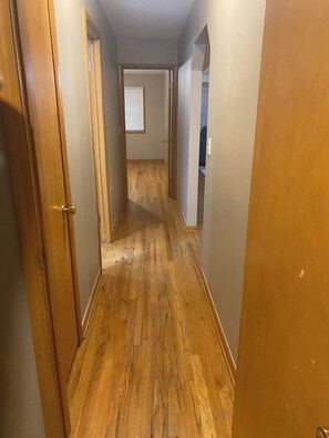Hallway that connects the 2 bedrooms and bathroom