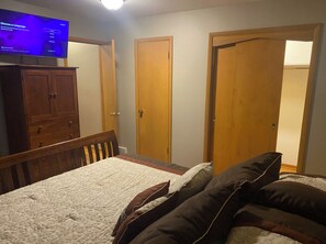 Main room King bed w smart tv and 2 full closets