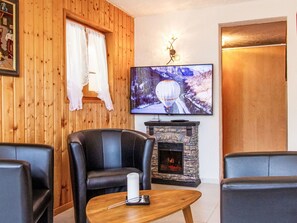 Furniture, Property, Picture Frame, Table, Wood, Interior Design, Living Room, Lighting, Television, Comfort