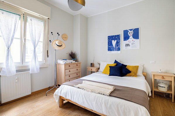 Bright bedroom with queen size bed
