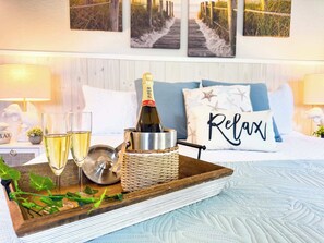The "Beach" master bedroom with a king-sized bed