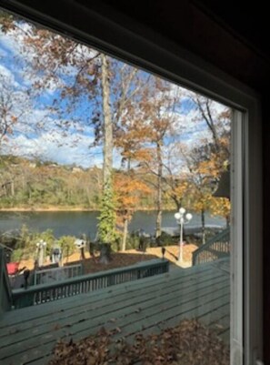 Living room view of lake and deck