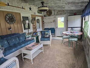 Enclosed porch facing the Mohican River 