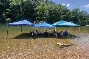 Sit and soak in the warm, clear waters of the James River.
