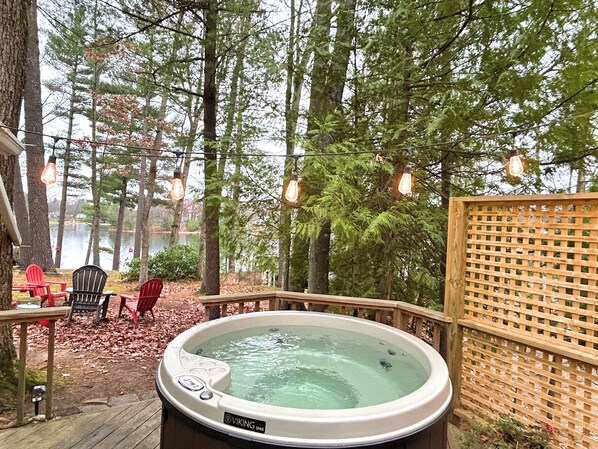 Relax in the 4 person hot tub while enjoying views of the lake!