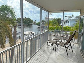 view of ocean from upstairs screened patio