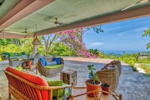 Outdoor living and dining room with magnificent view. 