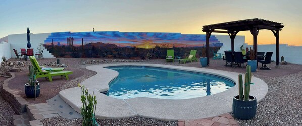 Find your oAZis. Gorgeous mural, heated pool, lots of seating. Fun for all.