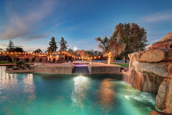 Amazing 500k 72,000 gallon pool with swim through grotto with waterfalls-slide