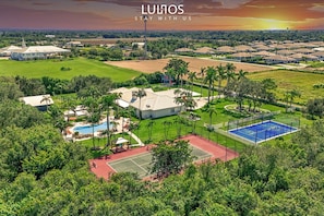 Experience luxury and nature in this exclusive retreat featuring a heated pool.