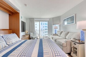 Murphy Bed - With a gentle pull the Dining Table Converts to a Bed