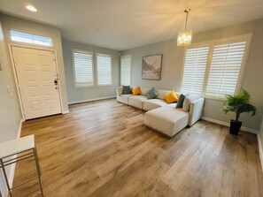 Living room welcomes you to enter the house, family members sit together 👍👍