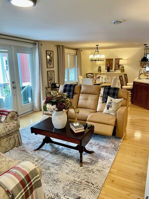 Open concept living room,kitchen, dining room, bathroom,queen bed ,laundry room