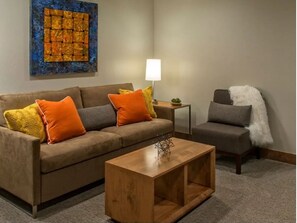 living room with queen size pull out bed