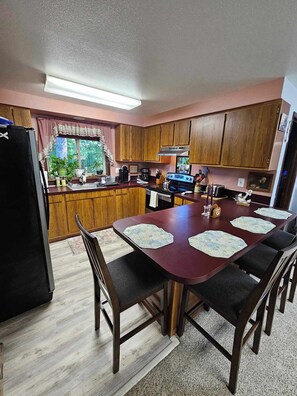 Kitchen and eating bar area
