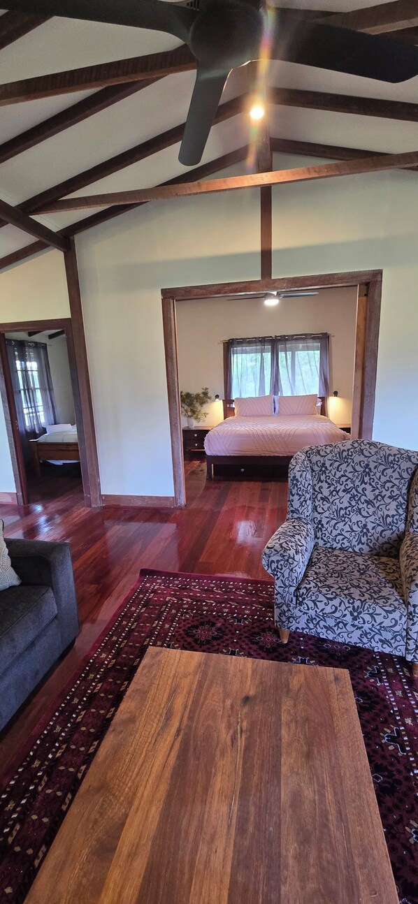 The master bedroom has large barn doors for you to slide close for privacy 