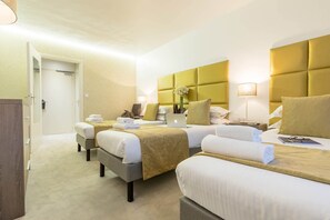Get a peaceful night sleep in our cozy bedroom, which has 3 Single beds.