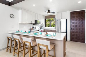 Fully Equipped Kitchen with Bar Seating