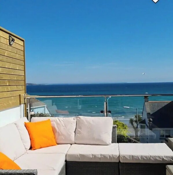 Beautiful decked balcony looking out over the Bay & St Michaels Mount 