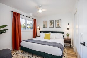 Comfortable King bed, room-darkening shades, Smart TV, and a closet for hanging your clothes.