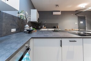 Explore culinary delights in our shared kitchen, perfect for cooking and socializing.