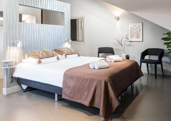 Sink into softness in a bedroom that pampers you in luxury.