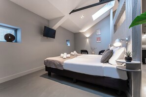 Unwind in style: This elegantly appointed room blends modern comfort with a tranquil aesthetic, perfect for relaxation and rejuvenation.